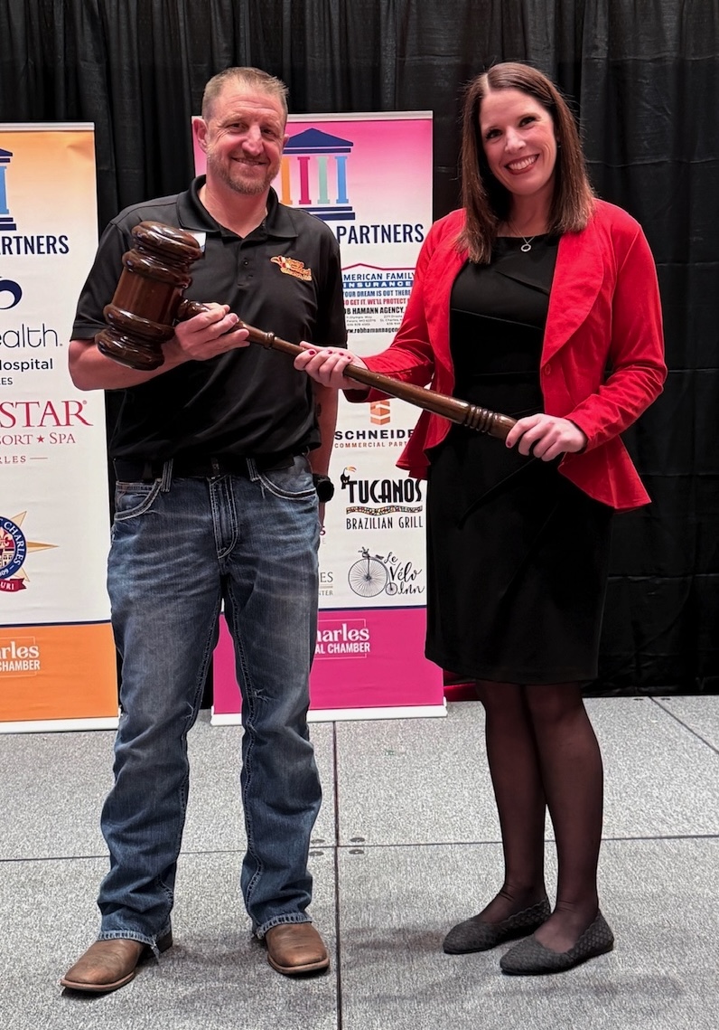 Kate handing over ceremonial gavel to Nathan