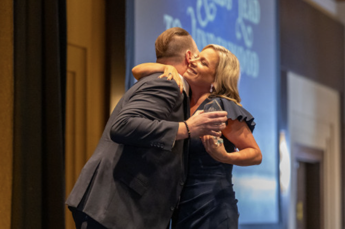 Stacee Gilmore receiving award