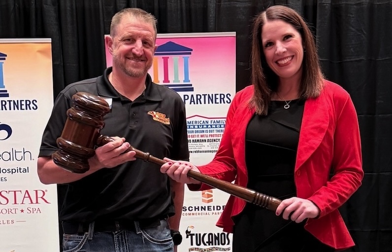 Kate handing over ceremonial gavel to Nathan